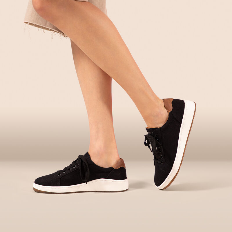 black canvas sneaker on foot